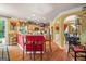 Open kitchen with a breakfast bar, hardwood floors, and access to the dining area at 4770 Shiloh Springs Rd, Cumming, GA 30040