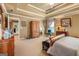 Bright main bedroom with tray ceilings, sitting area, and ample space at 4770 Shiloh Springs Rd, Cumming, GA 30040