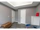 Neutral bedroom with wood floors, white trim and doors, a window, and gray walls at 1632 Zacharys Way, Mcdonough, GA 30253