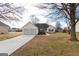 Charming ranch home with a two-car garage, stone accents, and well-maintained lawn at 1632 Zacharys Way, Mcdonough, GA 30253