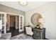 Cozy home office space with shiplap accent wall, functional desk, chair, and french door access at 2446 Naples St, Hoschton, GA 30548