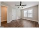 Bedroom featuring wood floors, a ceiling fan, neutral paint, and lots of natural light at 200 Adeline Nw Ave, Atlanta, GA 30314
