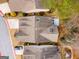 Aerial view of home featuring landscaping, driveway, and patio at 103 Augusta Dr, Peachtree City, GA 30269