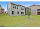 Well-maintained backyard with lush green grass and thoughtful landscaping around the perimeter at 208 Cottonwood Cir, Peachtree City, GA 30269