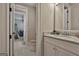 Bathroom with tile floors, granite counters, and view to bedroom at 208 Cottonwood Cir, Peachtree City, GA 30269