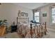 Charming bedroom featuring a metal bed frame, floral bedding, and bright natural light from a window at 208 Cottonwood Cir, Peachtree City, GA 30269