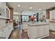 Spacious kitchen view leading to the dining and living area with ample countertop space at 208 Cottonwood Cir, Peachtree City, GA 30269