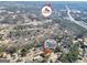 Aerial view of a community showcasing the residential area with mature trees at 701 Monticello Ln, Mcdonough, GA 30253