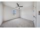 Bright bedroom with neutral carpet and a ceiling fan at 185 Paislee Park (Lot #10 Paislee Park) Dr, Fayetteville, GA 30215