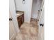 Bathroom boasts granite vanity top, tile flooring, and separate toilet at 101 Deer Park Dr, Carrollton, GA 30116
