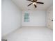 Bedroom boasts natural light from the window and soft carpeting at 101 Deer Park Dr, Carrollton, GA 30116
