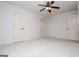 Bedroom features neutral walls, carpet, and multiple closets at 101 Deer Park Dr, Carrollton, GA 30116