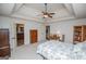 Generous bedroom showcasing tray ceiling, ensuite bathroom, and access to closet at 101 Deer Park Dr, Carrollton, GA 30116