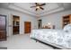 Generous bedroom showcasing tray ceiling, ensuite bathroom, and access to closet at 101 Deer Park Dr, Carrollton, GA 30116