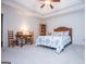 Bright bedroom with tray ceiling, carpet, furnishings, and serene atmosphere at 101 Deer Park Dr, Carrollton, GA 30116
