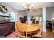 Dining room featuring a wooden table with chairs, a buffet, and a view of the living room at 101 Deer Park Dr, Carrollton, GA 30116