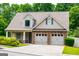 Charming two-story home featuring stone accents, a two-car garage, and a cozy front porch at 101 Deer Park Dr, Carrollton, GA 30116