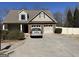 Charming two-story home with a two-car garage, manicured lawn, and lovely curb appeal on a sunny day at 101 Deer Park Dr, Carrollton, GA 30116