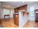 A modern kitchen with granite countertops, stainless steel appliances, and breakfast bar at 101 Deer Park Dr, Carrollton, GA 30116