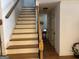 Staircase with wood treads and white risers, leading to upper level of home at 101 Deer Park Dr, Carrollton, GA 30116