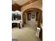 Spacious bathroom featuring a vanity area and soaking tub under windows with detailed wood trim at 275 Old Mill Ct, Fayetteville, GA 30214