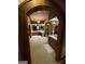 Bathroom features arched entryways with vanities and mirrors, providing ample space and lighting at 275 Old Mill Ct, Fayetteville, GA 30214