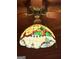 Stained glass fan light over game room billiard table at 275 Old Mill Ct, Fayetteville, GA 30214
