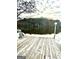 Dock provides a serene spot on the water, with a lush treeline reflecting on the lake's surface at 275 Old Mill Ct, Fayetteville, GA 30214