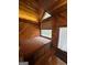A hot tub room featuring vaulted ceilings, wood paneling, and an exterior door at 275 Old Mill Ct, Fayetteville, GA 30214