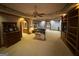 Open layout in main bedroom includes built-in shelving and an arched entryway to bathroom and closet at 275 Old Mill Ct, Fayetteville, GA 30214