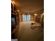 Spacious main bedroom with built-in shelving, access to outdoor patio, and sitting area at 275 Old Mill Ct, Fayetteville, GA 30214