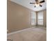 Bedroom featuring neutral walls, carpet flooring and two windows bringing in natural light at 830 Streamside Dr, Mcdonough, GA 30252