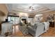 Inviting living room featuring a cozy fireplace, hardwood floors, and a neutral color palette at 830 Streamside Dr, Mcdonough, GA 30252