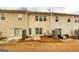 Townhome featuring a quaint backyard patio with space for outdoor seating, a sliding glass door, and a fenced yard at 2786 Snapfinger Mnr, Decatur, GA 30035