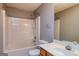 Clean bathroom featuring a shower-tub combo, toilet, vanity, and mirror, providing a functional space at 2786 Snapfinger Mnr, Decatur, GA 30035