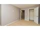 Comfortable bedroom showcasing a closet, neutral walls, plush carpeting, and a cozy atmosphere at 2786 Snapfinger Mnr, Decatur, GA 30035