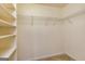 Spacious walk-in closet with built-in shelving and wire racks for optimal organization and storage space at 2786 Snapfinger Mnr, Decatur, GA 30035