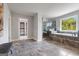 This bathroom features a luxurious soaking tub, granite countertops, separate shower and elegant tile flooring at 5915 Langdale Chase # 16, Douglasville, GA 30135