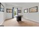 Comfortable bedroom with neutral carpet, ample natural light, and stylish wall decor at 5915 Langdale Chase # 16, Douglasville, GA 30135