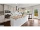 Spacious kitchen with stainless steel appliances, granite countertops, and large center island at 5915 Langdale Chase # 16, Douglasville, GA 30135