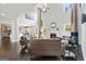 Open-concept living room featuring high ceilings, hardwood floors, and a fireplace at 5915 Langdale Chase # 16, Douglasville, GA 30135