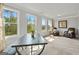 Sitting area features a table and chairs and scenic outdoor views for a relaxing space at 5915 Langdale Chase # 16, Douglasville, GA 30135