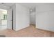 Bedroom closet features carpet, a wire shelf, and neutral walls at 6600 Wansfell Ct # 28, Douglasville, GA 30135