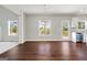 Dining area with hardwood floors, modern lighting, and access to a well-equipped kitchen at 6600 Wansfell Ct # 28, Douglasville, GA 30135