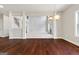 Elegant living room showcasing hardwood floors and an open concept design with natural light at 6600 Wansfell Ct # 28, Douglasville, GA 30135