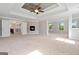The main bedroom is spacious, features a fireplace, and has a trey ceiling with fan at 6600 Wansfell Ct # 28, Douglasville, GA 30135