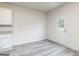 Bright kitchen has white cabinets and granite countertops, and outside access at 287 Limestone Circle, Conyers, GA 30013