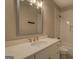 Stylish bathroom features white vanity with elegant countertop, modern fixtures, and subway tile shower at 5118 N Pratt St, Covington, GA 30014