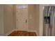 Bright entryway features a tiled floor, neutral walls, and convenient access to the refrigerator at 5118 N Pratt St, Covington, GA 30014