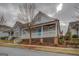 Side view of home featuring covered porch at 5118 N Pratt St, Covington, GA 30014